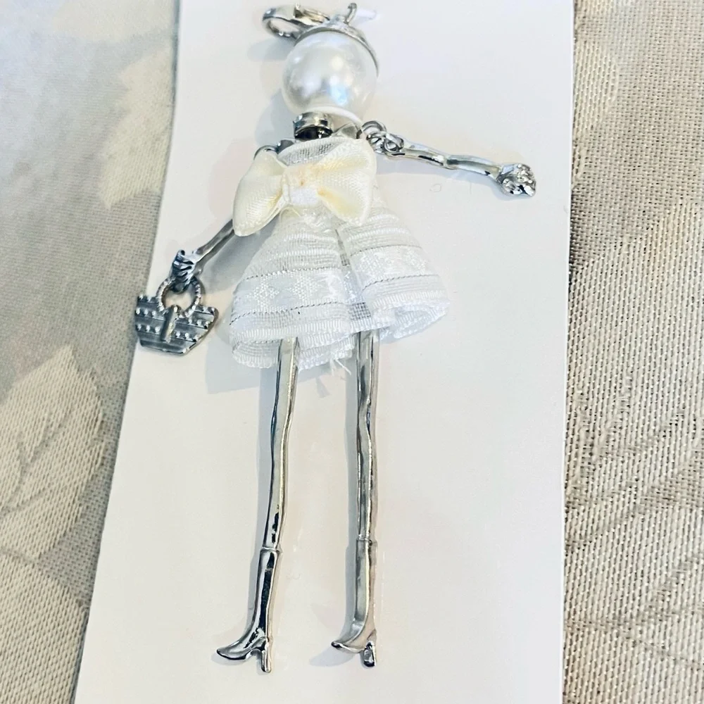 Jolees laliberi doll pendant